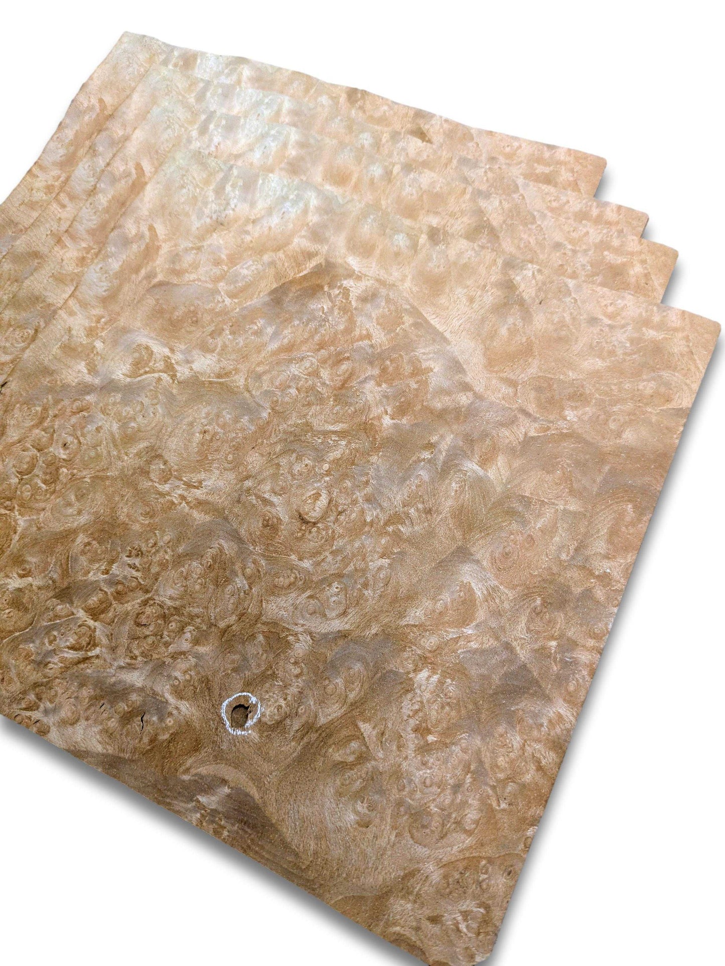 Onbehandelde madrona wortel fineervellen in natuurlijk patroon, perfect voor kunst- en knutseltoepassingen of renovatie.